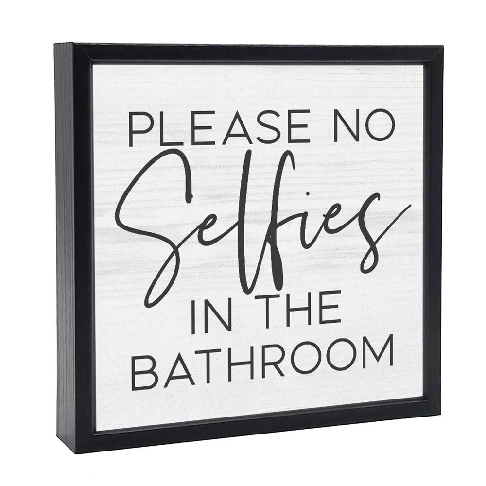 Please no selfies in the bathroom sign